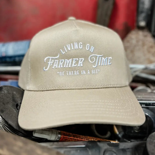 Living On Farmer Time Trucker Hat in Tan