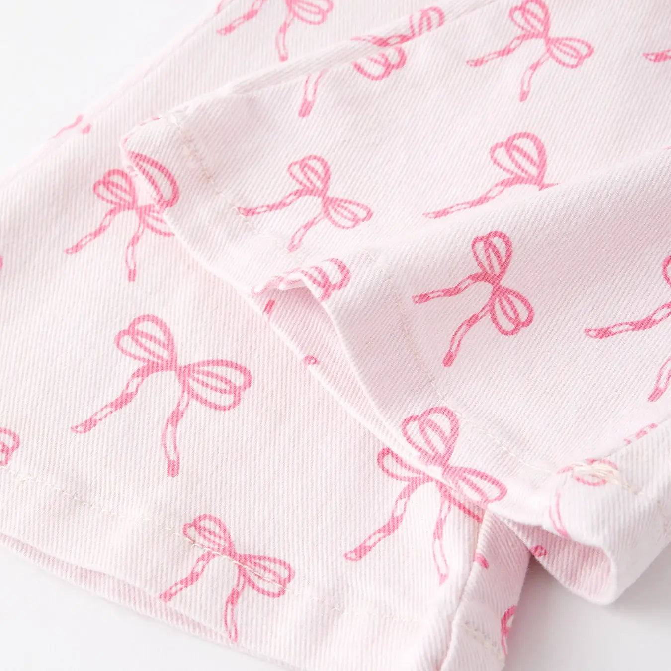 Girls Pink Bow Print Elastic Flared Jeans PREORDER