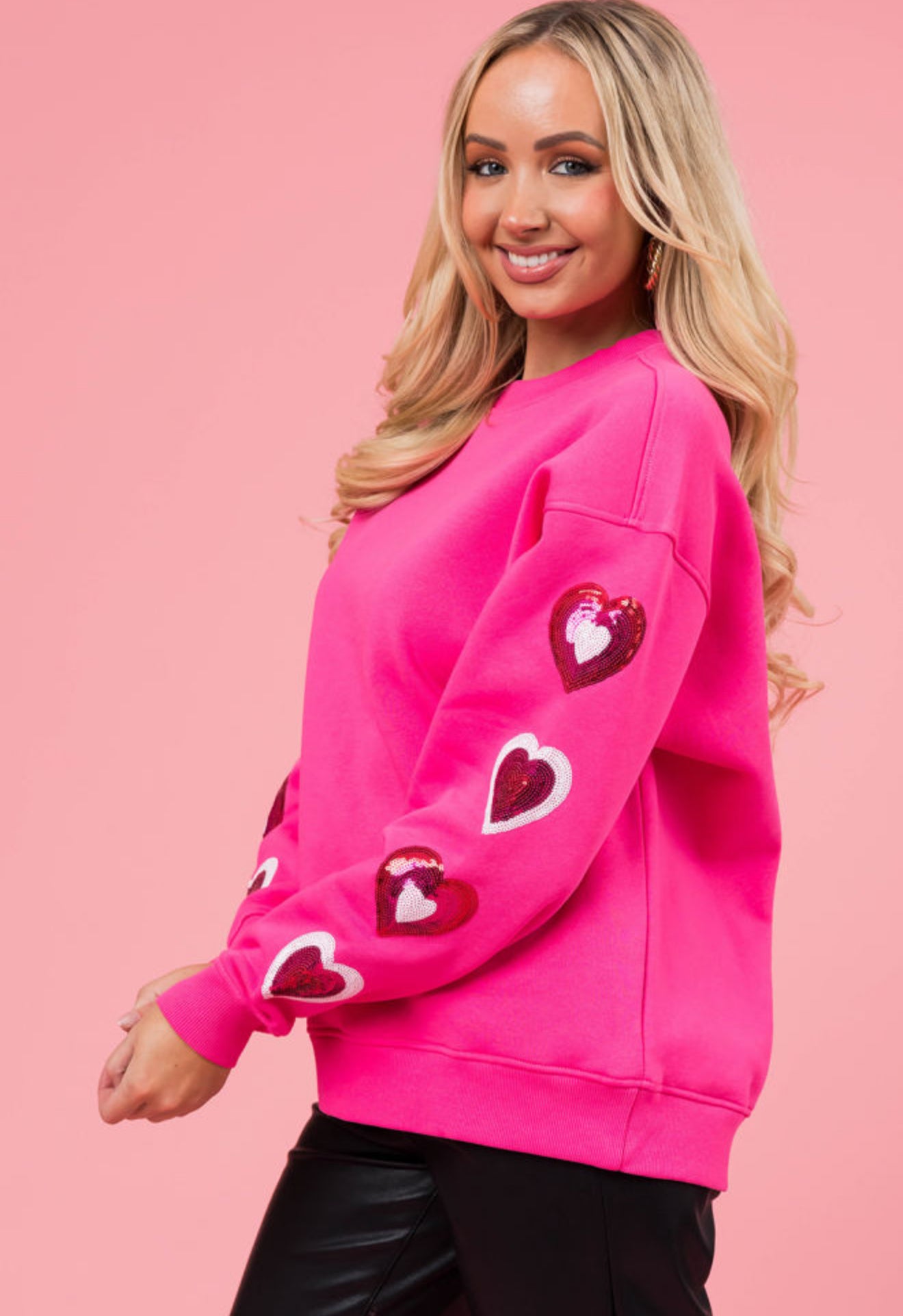 Bonbon Sequined Heart Patched Drop
Shoulder Valentines Sweatshirt PREORDER